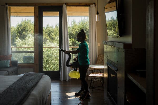 A hotel room in Long Beach, Wash., being fogged with sanitizer. “There’s really no evidence that anyone has ever gotten Covid-19 by touching a contaminated surface,” one researcher noted.